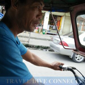 Reynan and his tricycle